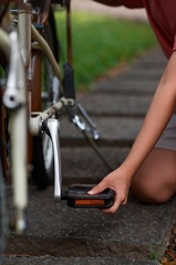 side-view-kid-repairing-bicycle 23-2150348432