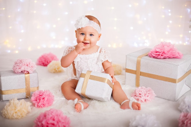 little-baby-girl-sitting-among-lot-gift-boxes-celebrating-birthday-christmas_439918-1730.jpg