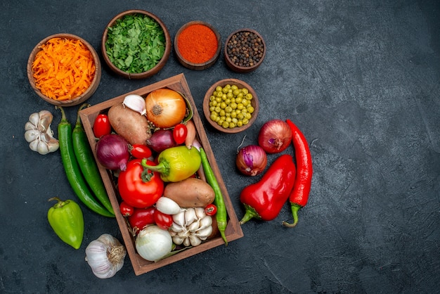 top-view-fresh-vegetables-with-greens-dark-table-color-ripe-salad-vegetable_140725-72687.jpg